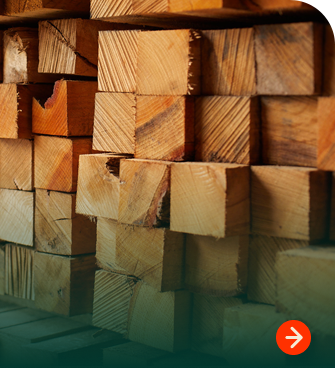 Stacked hardwood timbers and rough sawn lumber