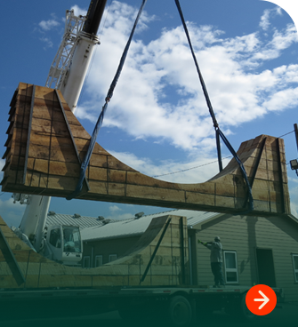 Custom wood shipping saddle for cylindrical freight transport